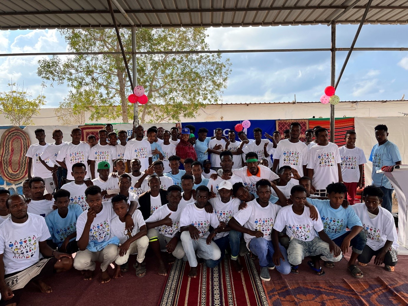 Migrants celebrating the International Migrants Day at the MRC in Obock. © Photo: IOM Djibouti 2022